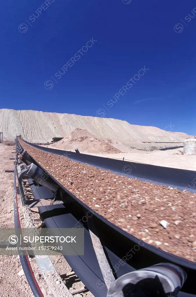 Conveyer belt moving mining products along