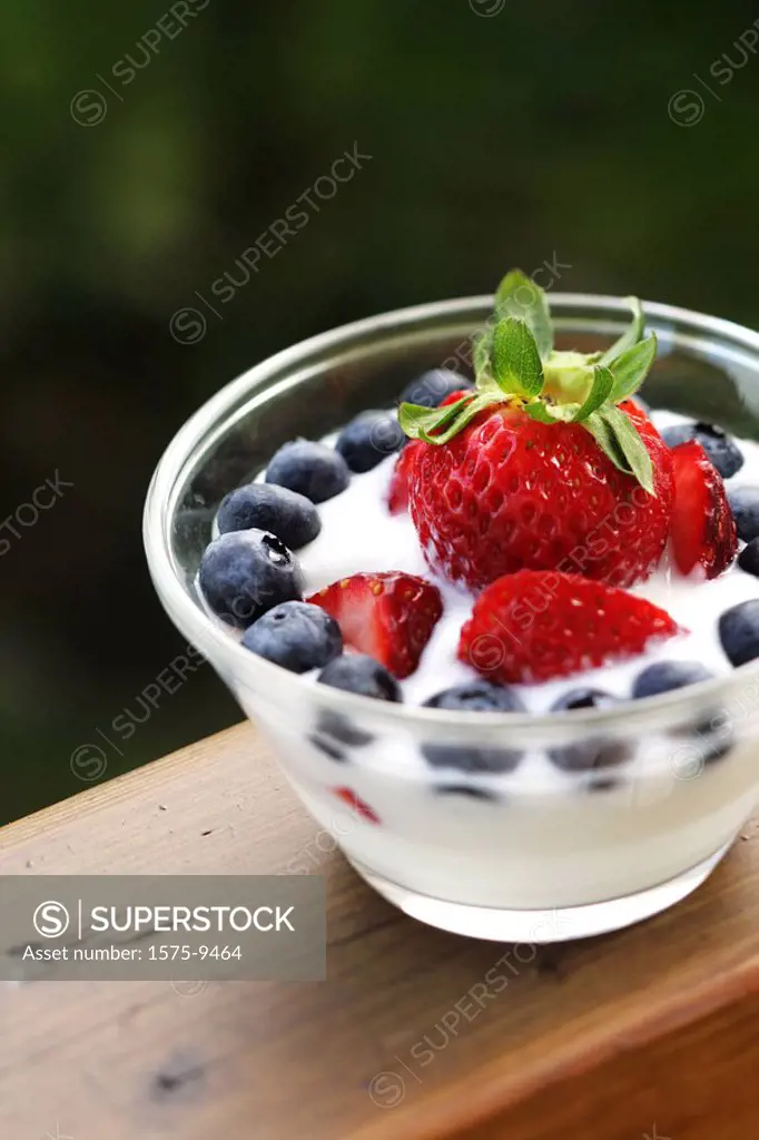 Strawberries, blueberries and milk
