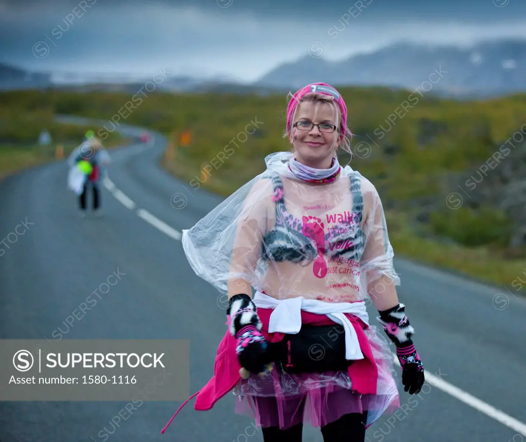 Woman unite in the fight against breast cancer during a fundraiser, Moon Walk, Lake Myvatn, Iceland