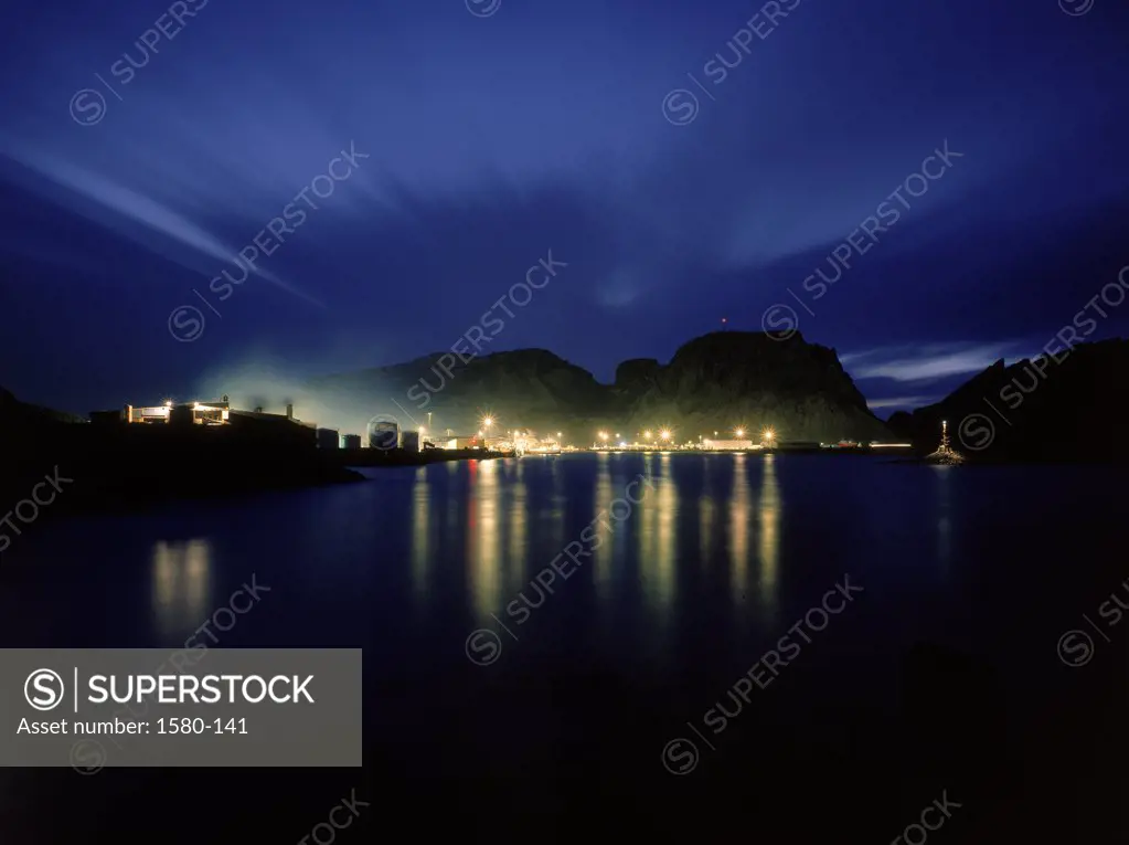 Reflection of electric lights in water, Heimaey Island, Iceland