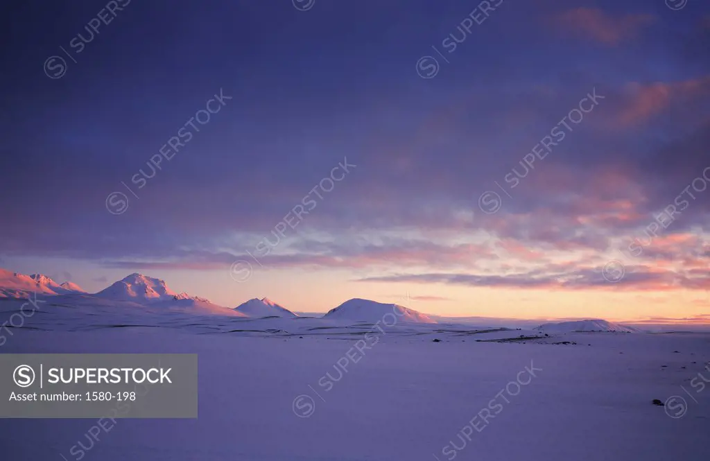 Panoramic view of a polar landscape with a mountain in the background, Mount Kerlingafjoll, Iceland