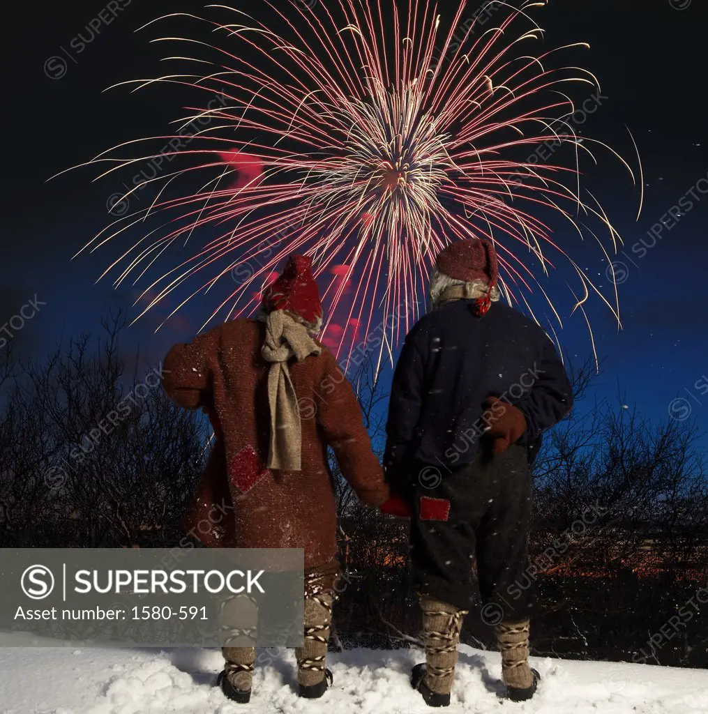 Iceland, New Year's Eve, Two Yule lads watching fireworks