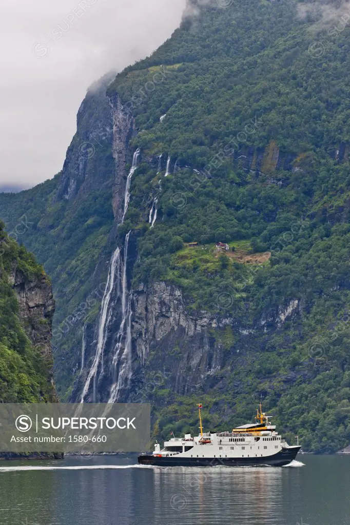 Cruise ship by Seven Sisters Waterfall, Geirangerfjord, Norway