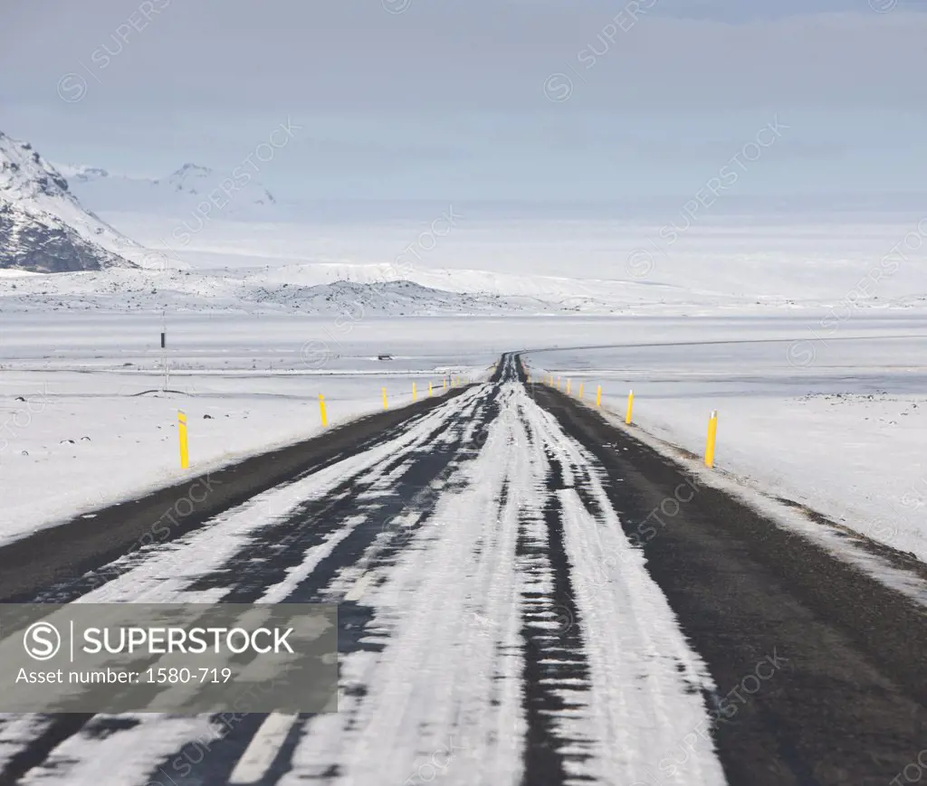Snow covered road in winter, Route 1, Iceland