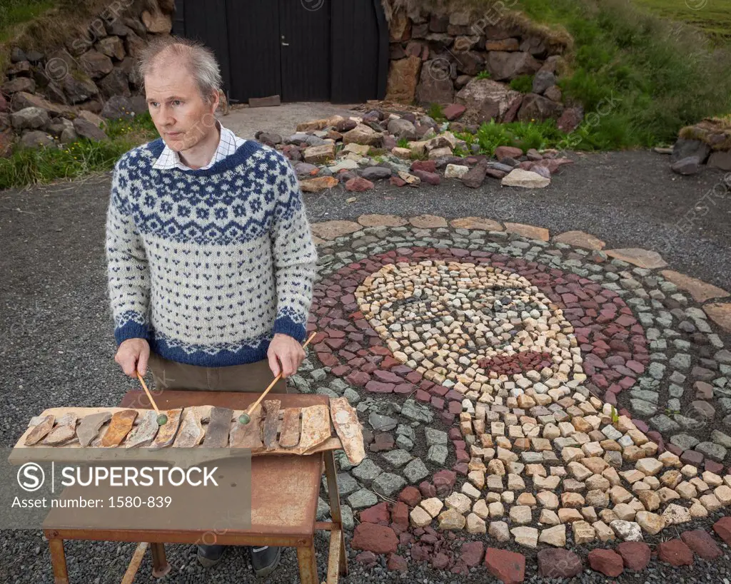 Iceland, Borgarfjordur, Stone Artist with handmade xylophone and other works
