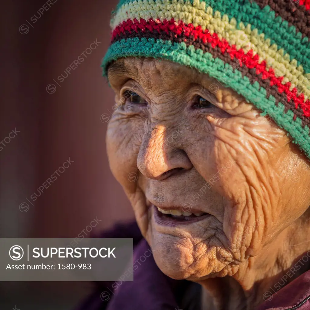 Greenland, village of Ittoqqortoormiit (Scoresbysund), Elderly Inuit woman