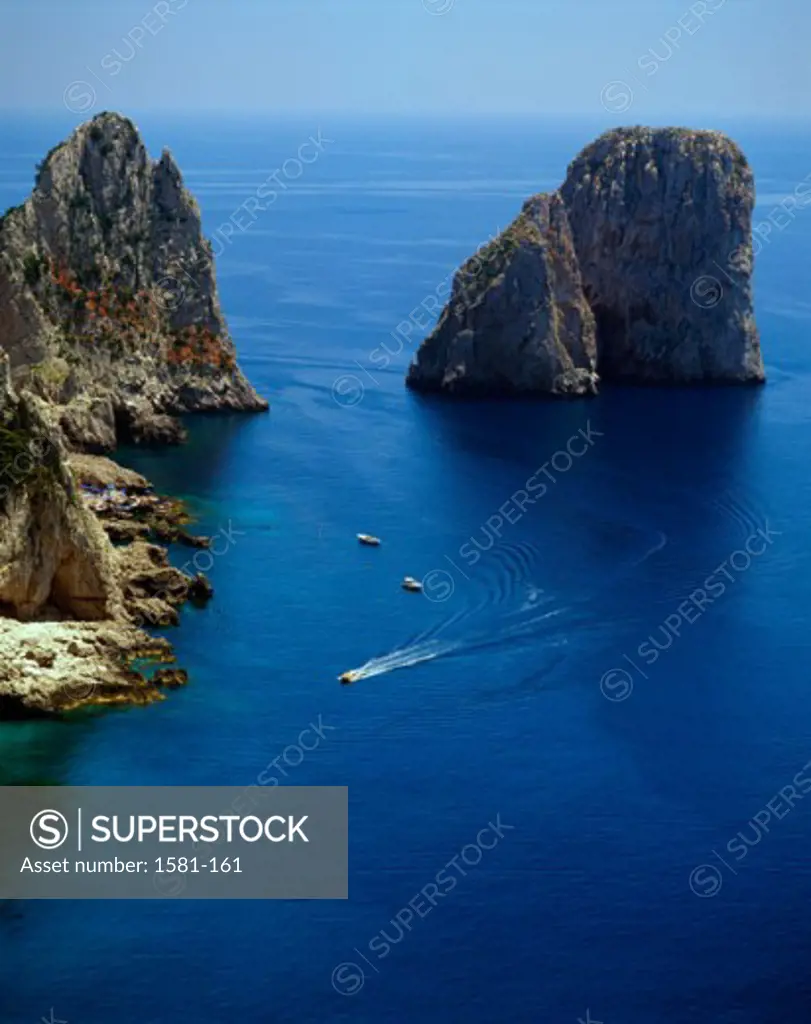 High angle view of rocks in the sea, Faraglioni Rocks, Capri, Italy
