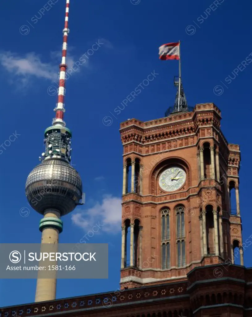 Low angle view of a government building and a communication tower, Red Town Hall, Berlin, Germany