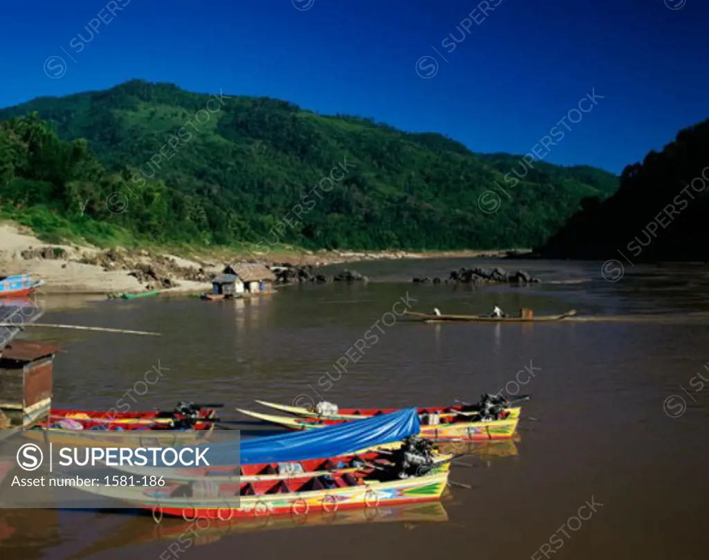 Boats moored at a dock, Pakbeng, Laos