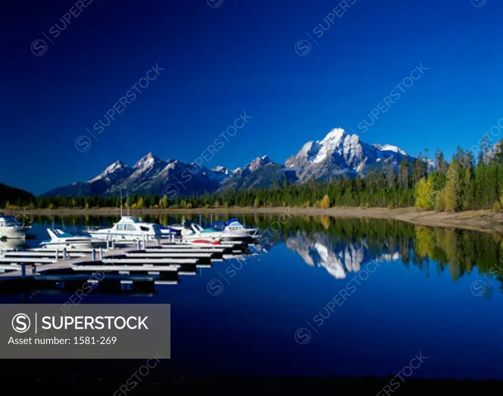 Reflection of mountains in a lake, Jackson Lake, Grand Teton National Park, Wyoming, USA