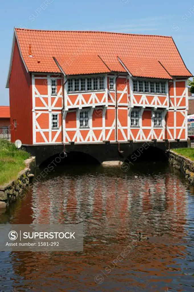 House over a canal, Wismar, Germany