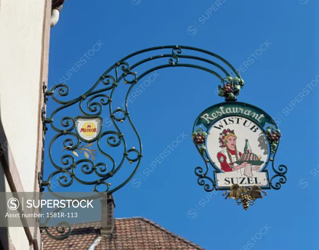 Low angle view of a restaurant sign, Eguisheim, France