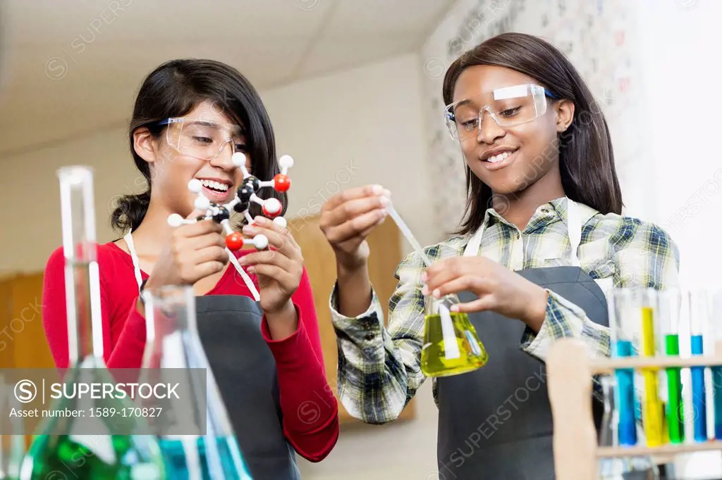 Students working with chemicals in classroom