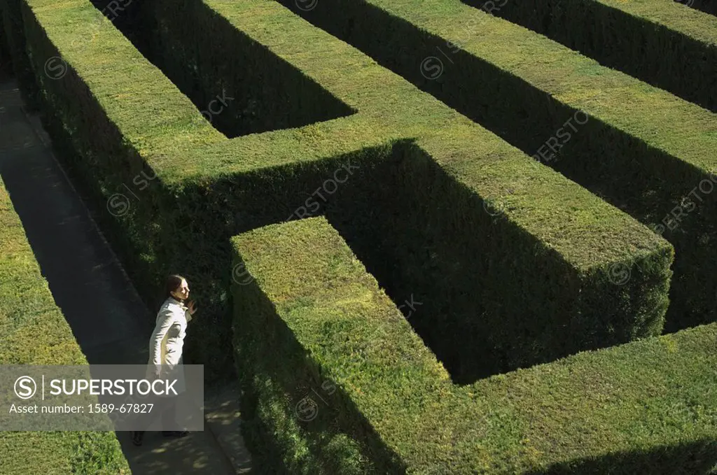 High angle view of woman in labyrinth