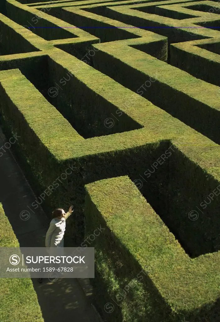 High angle view of woman in labyrinth