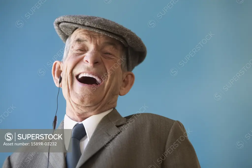 Close-up of a senior man laughing