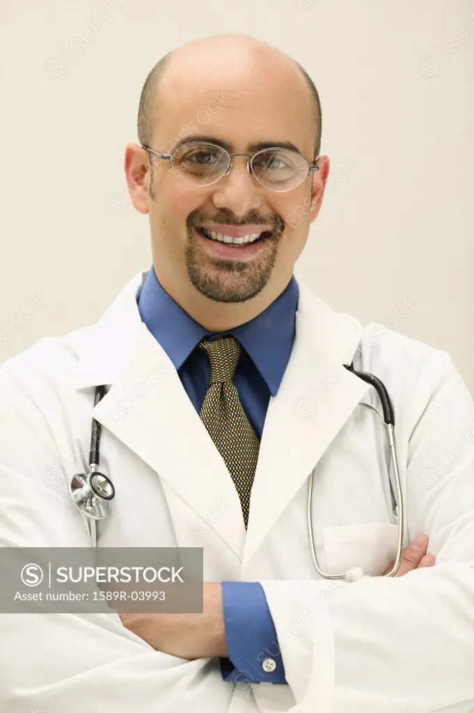 Male doctor looking at camera smiling