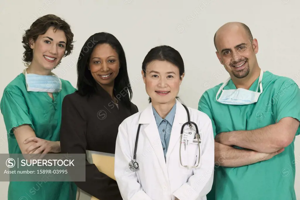 Group of doctors looking at looking at camera smiling