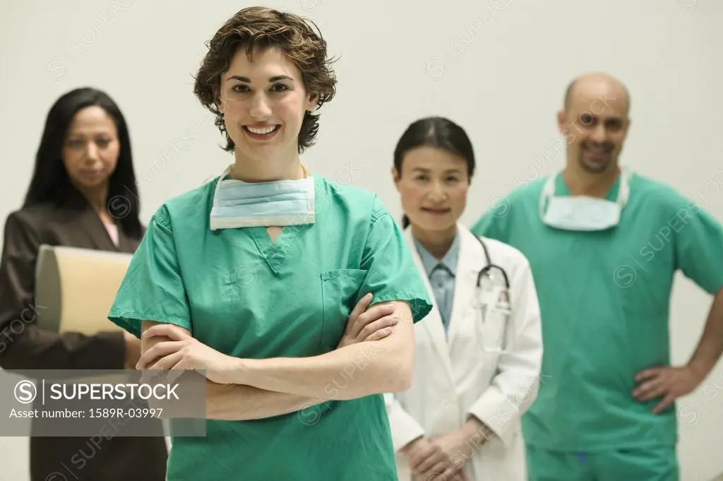 Group of doctors looking at camera smiling