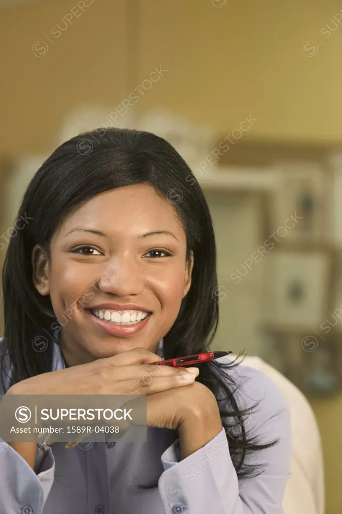 Portrait of a businesswoman looking at camera smiling