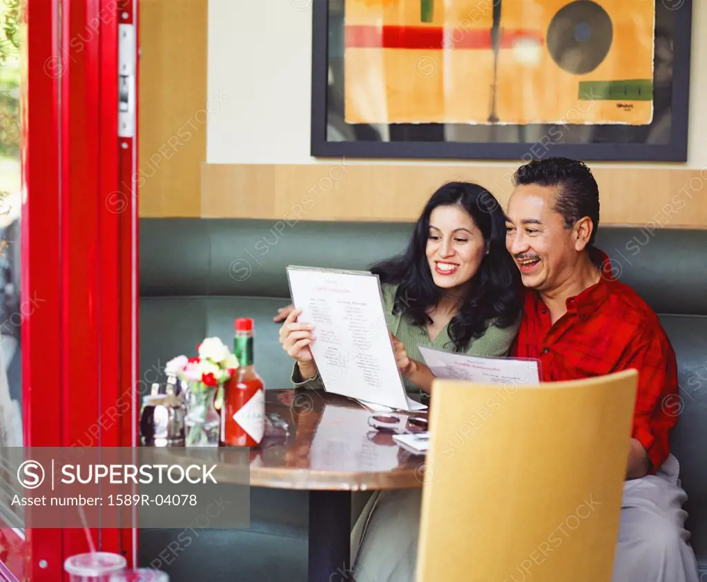 Mid adult couple sitting in a restaurant