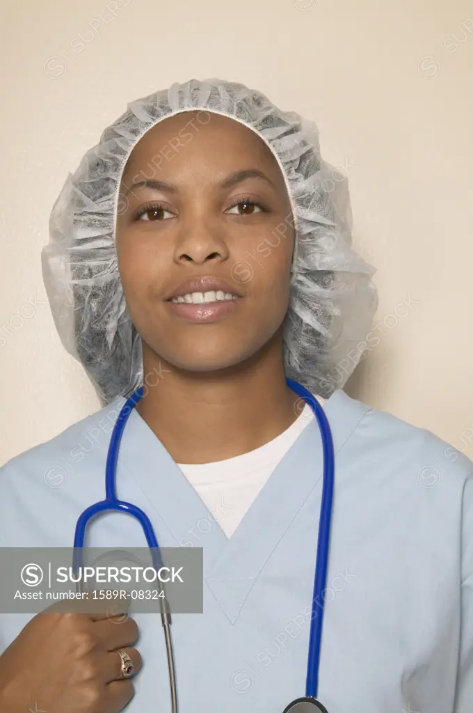 Portrait of a female doctor holding a stethoscope around her neck