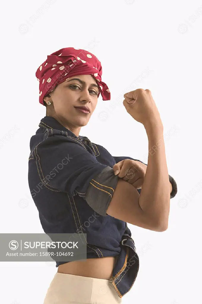 Young woman dressed as Rosie the Riveter”