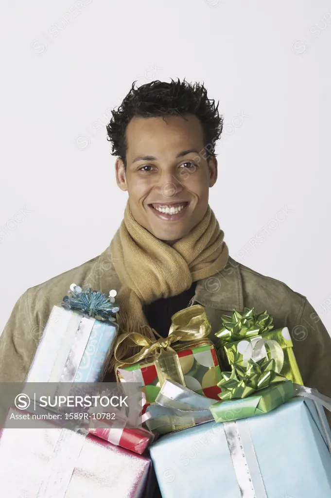 Portrait of young man with gifts