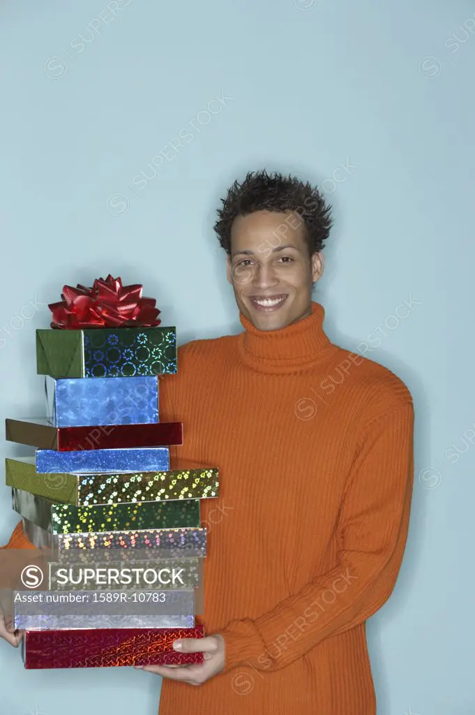 Portrait of young man with gifts