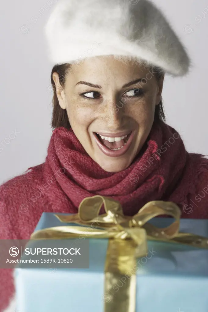 Young woman receiving gift