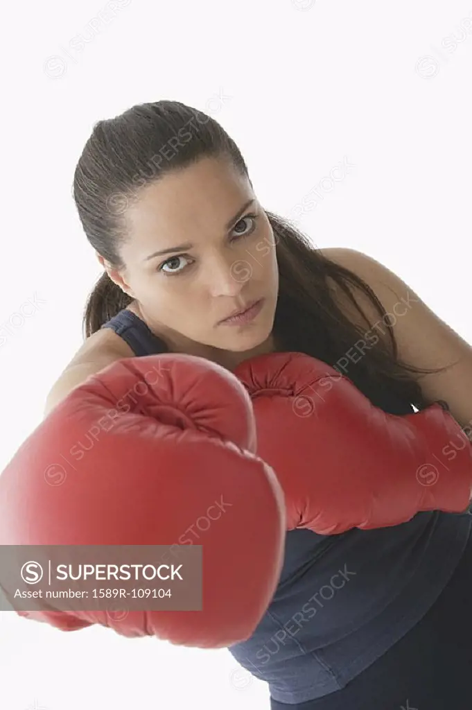 Portrait of woman with boxing gloves