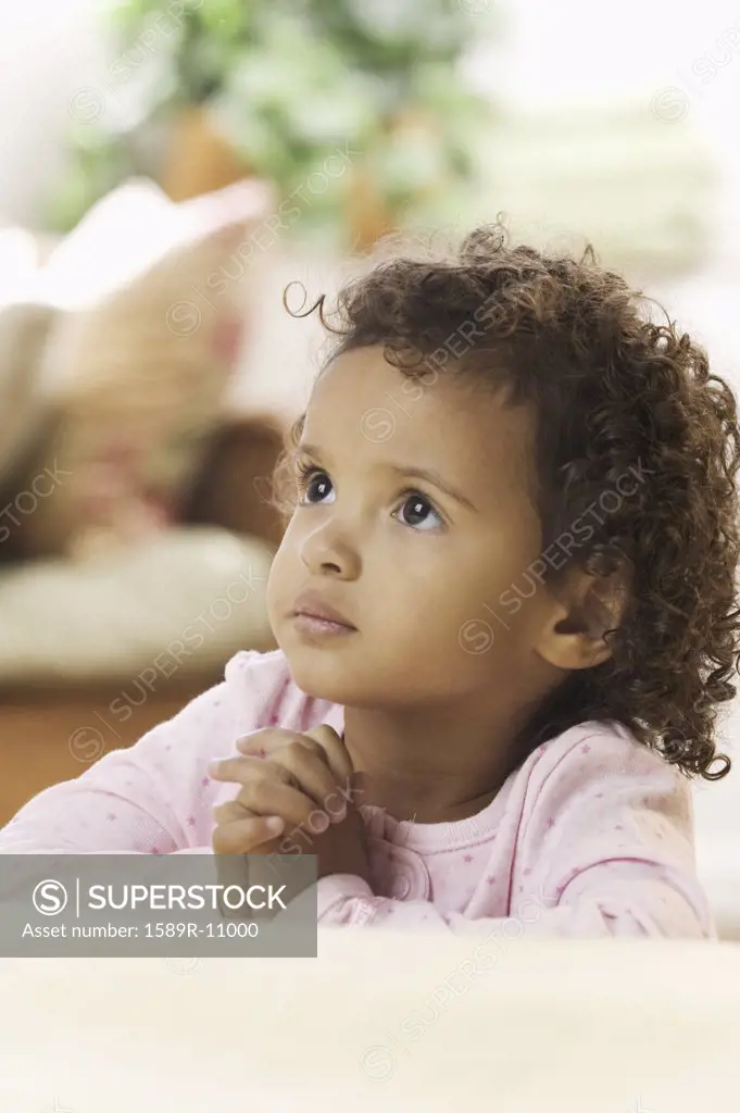 Close-up of a girl praying