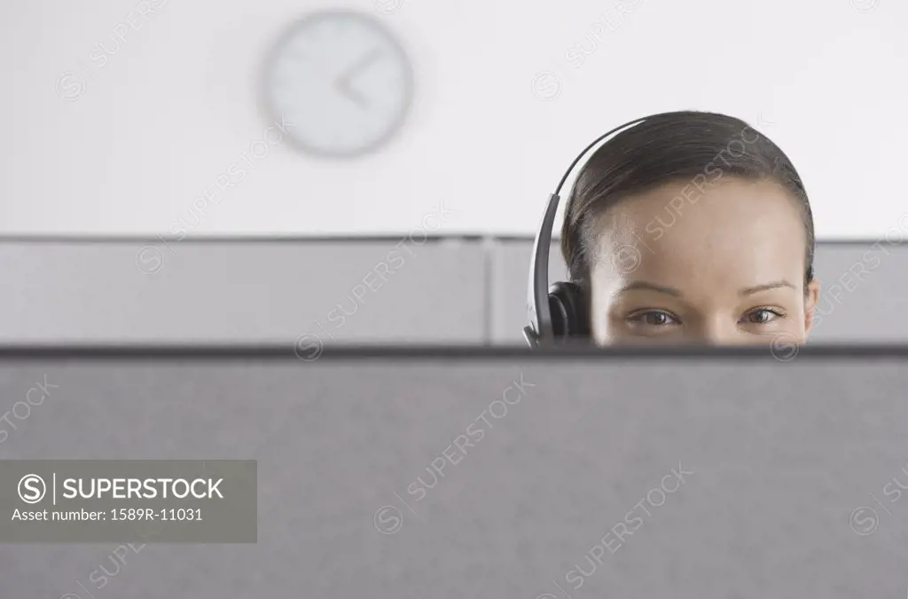 Upper section of womanís head in office