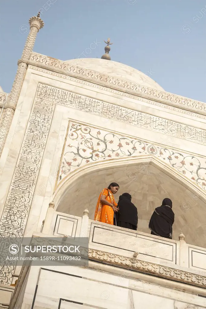 Women on balcony of Shah Jahan mosque, Agra, India
