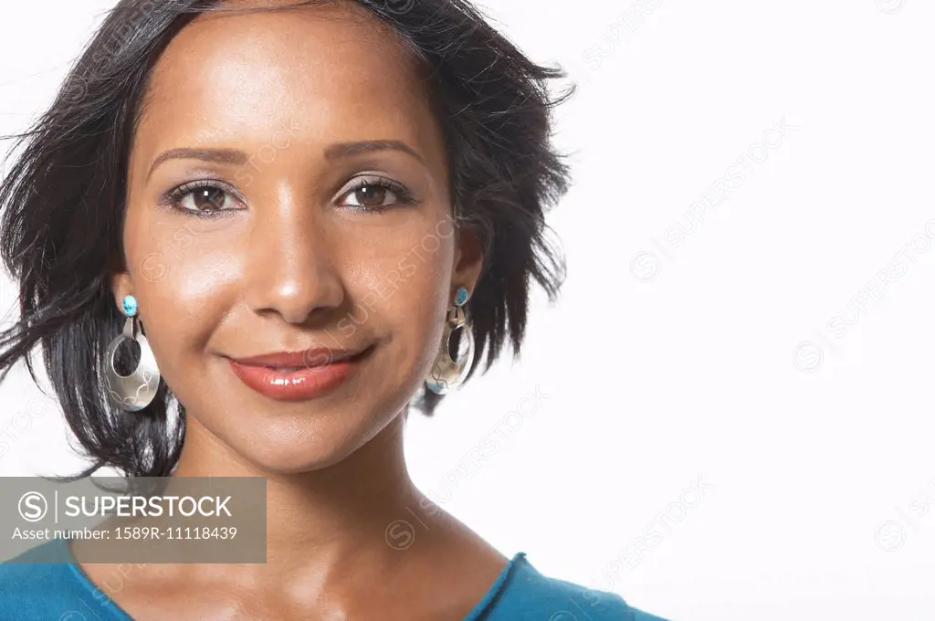 Mixed race woman smiling