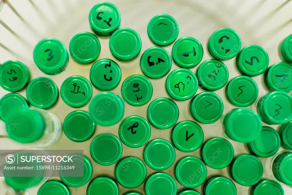 Green lids on test tubes