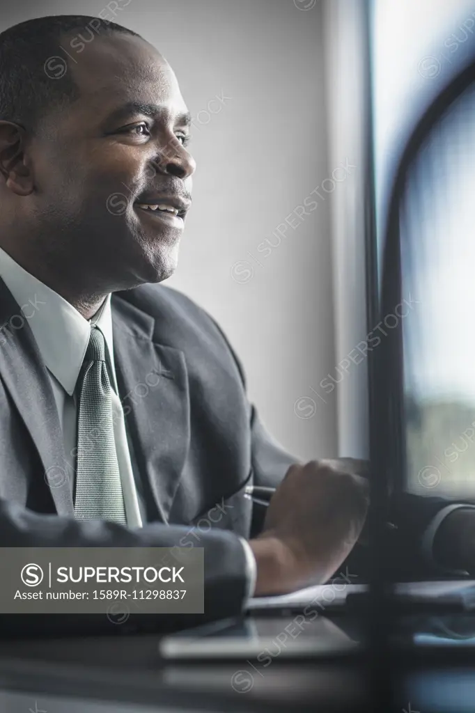 African American businessman working at desk