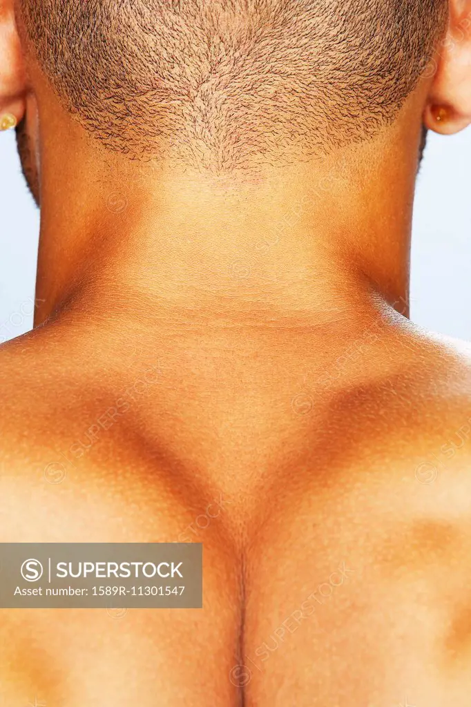Close up of mixed race man's neck