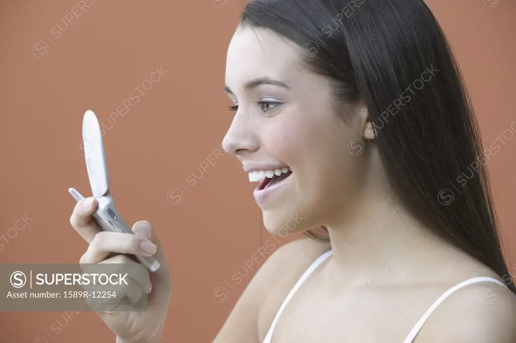 Teenage girl checking text messages