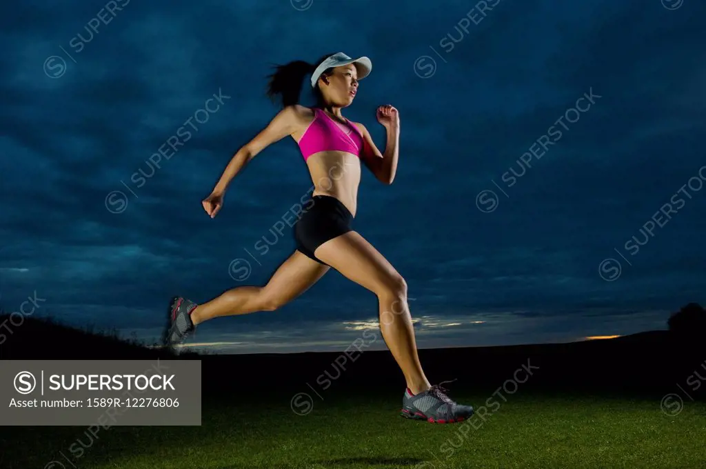 Japanese woman running at night