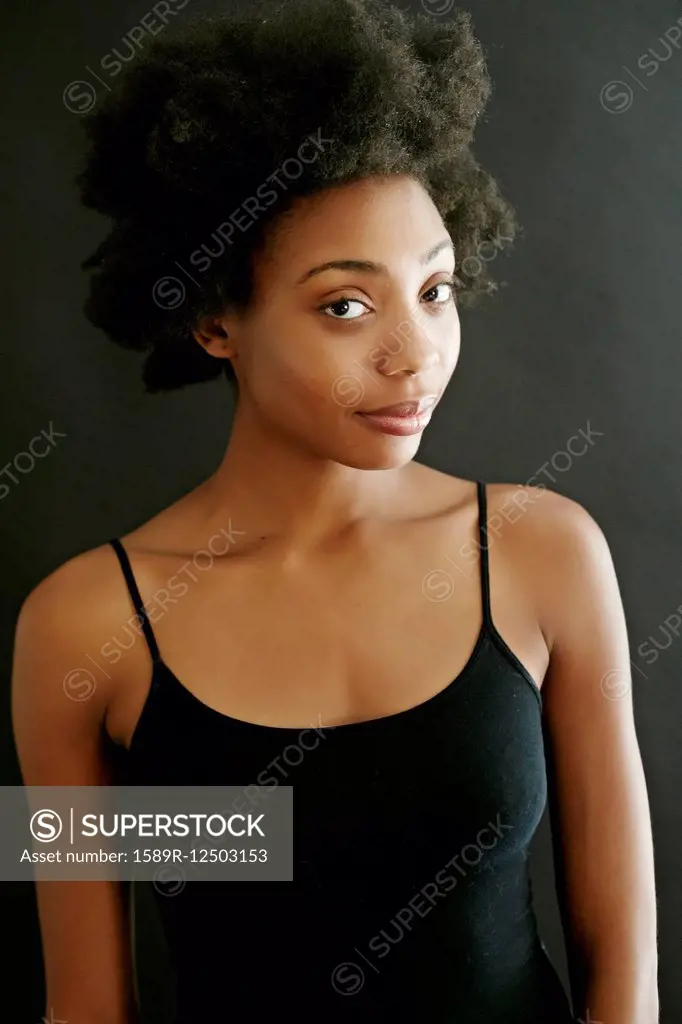 Close up of smirking black woman