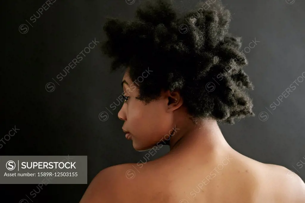 Close up of black woman looking over shoulder