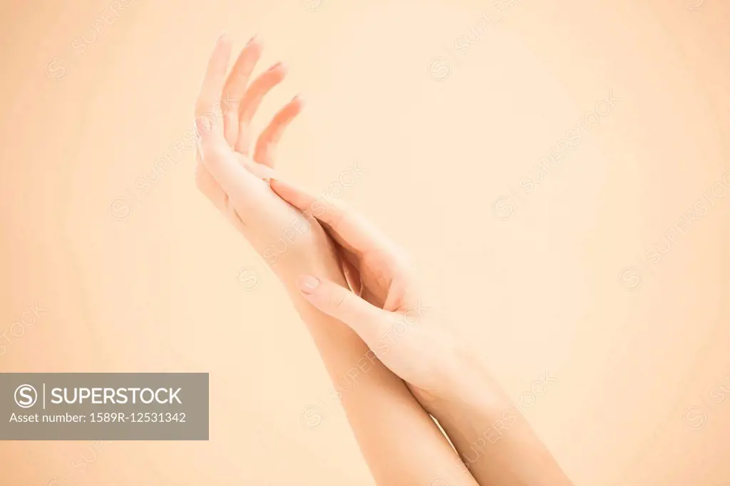 Close up of hands of woman rubbing