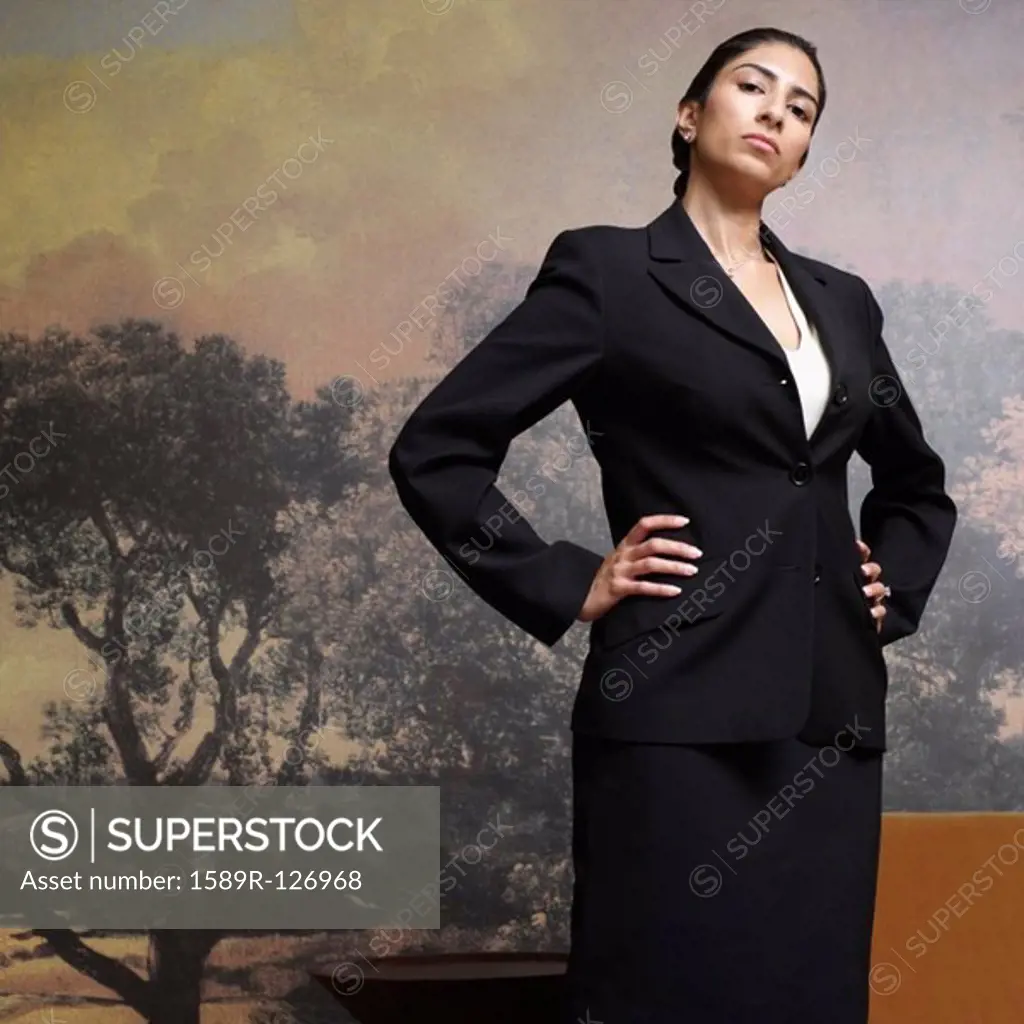 Indian businesswoman with hands on hips