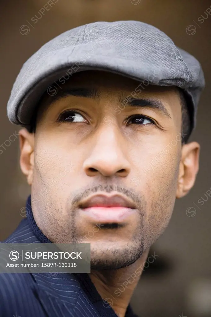 African American man wearing cap