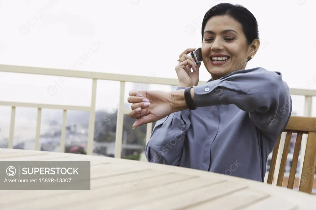 Woman checking the time on her watch