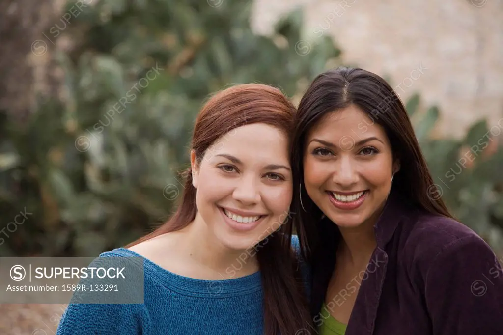 Woman smiling together