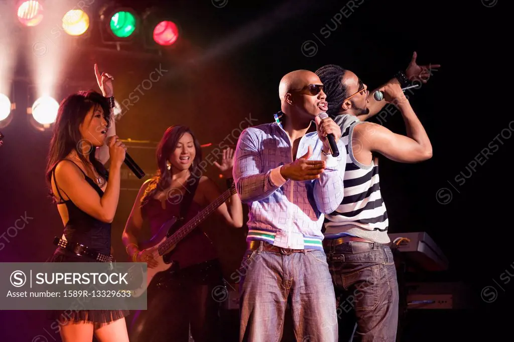 Musical group performing onstage