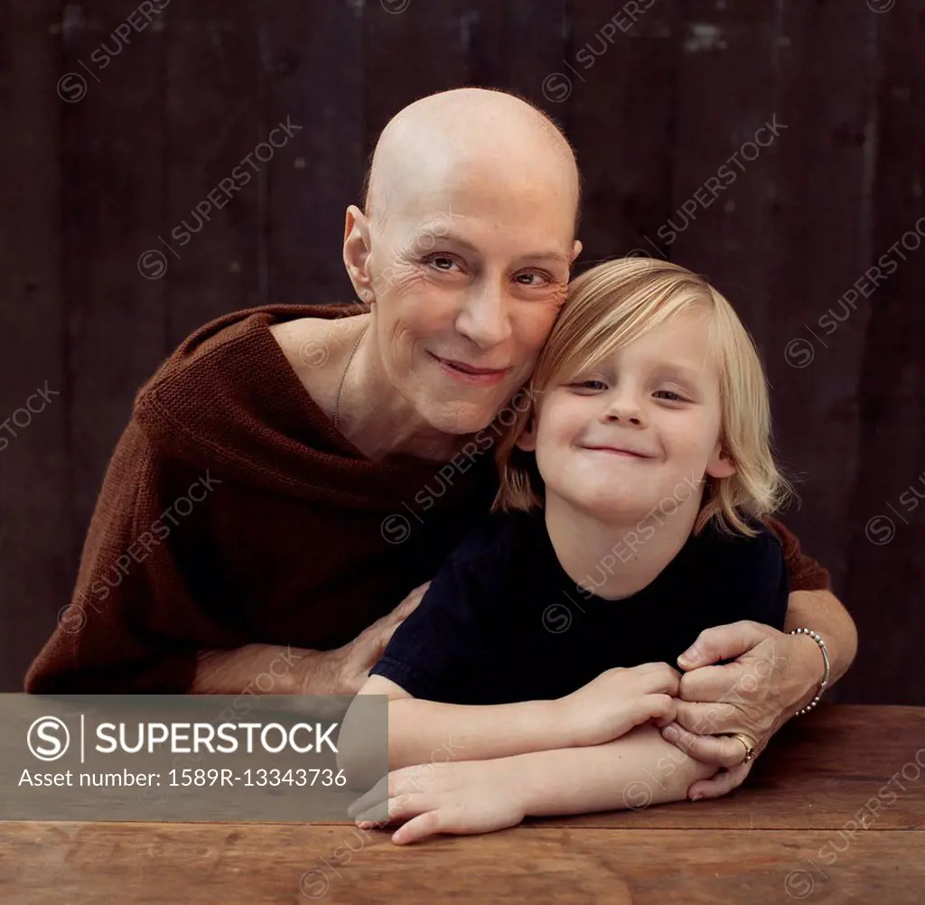 Older Caucasian cancer survivor with grandson