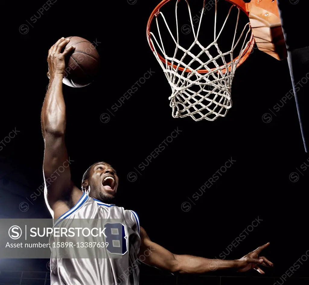 African basketball player scoring